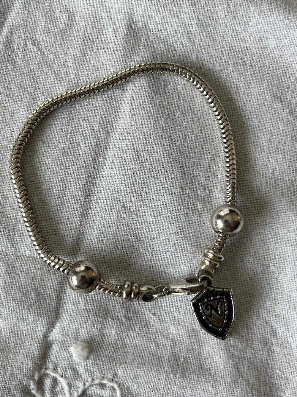 Nomades Silver serpentine 7” charm bracelet